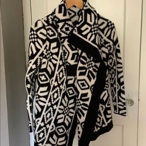 Sleeved poncho style sweater